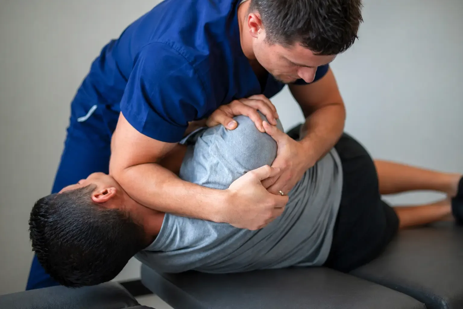 Dr. Palmer adjusting an athlete at Life Charge Chiropractic Gallatin TN at Life Charge Chiropractic Gallatin TN
