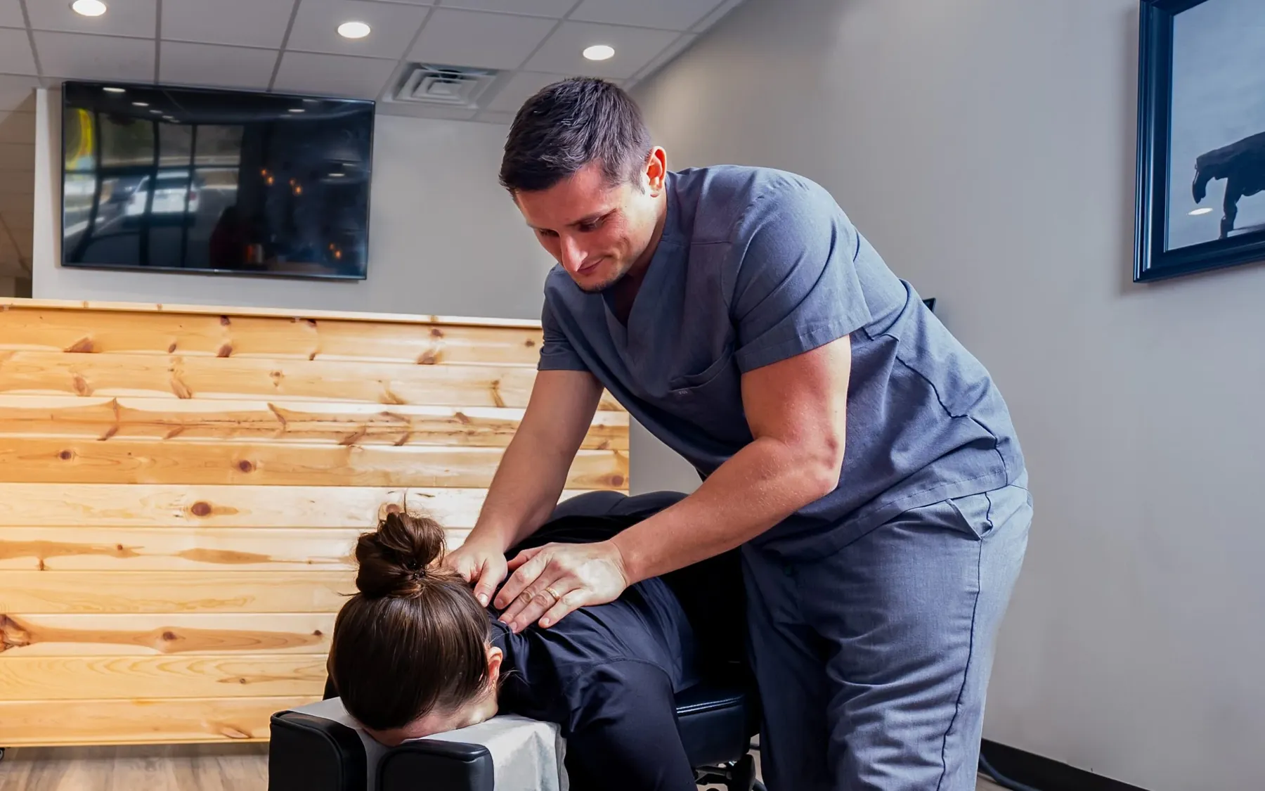 Dr. Palmer adjusting patient