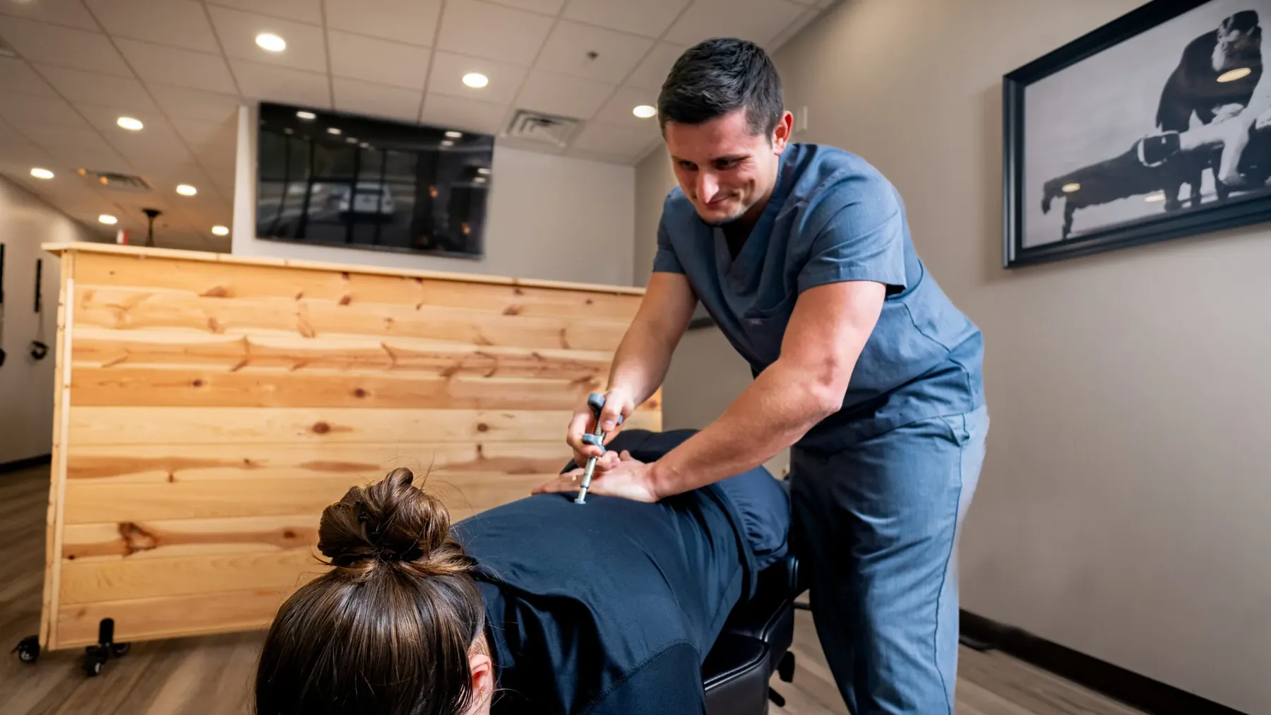 Dr. Palmer performing a cervical spine assessment for headache evaluation